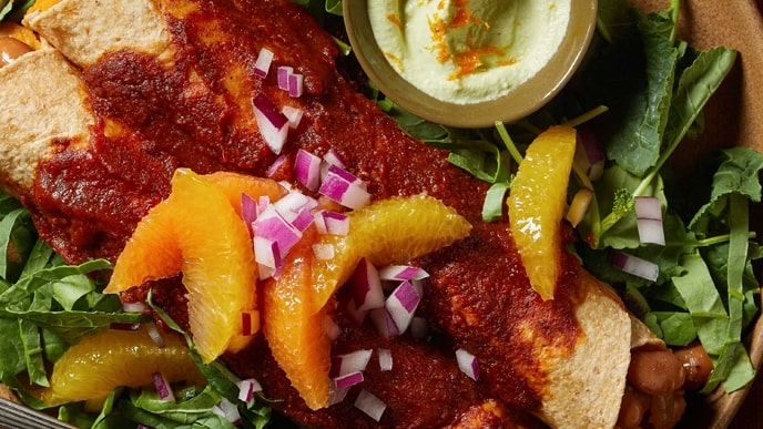 Bean-and-Sweet-Potato-Enchiladas-with-Cilantro-Orange-Crema-wordpress-min