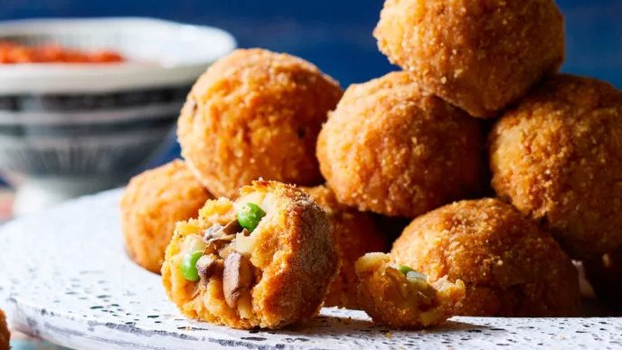 Sicilian Rice Balls With Mushrooms And Peas