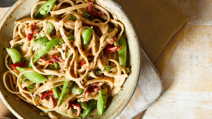 White Bean Fettuccine Alfredo With Peas And Sun-Dried Tomatoes