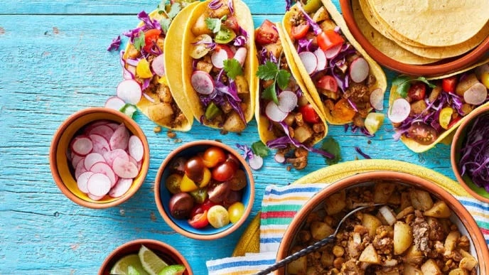 A mix of mushrooms, walnuts, and chickpeas make a meaty vehicle for savory seasonings in this plant-based take on chorizo tacos. Potatoes add extra heartiness to the chorizo mix. Even meat eaters will love this restaurant-quality recipe! For serving, set out the whole skillet of mushroom chorizo along with tortillas and assorted toppings.
